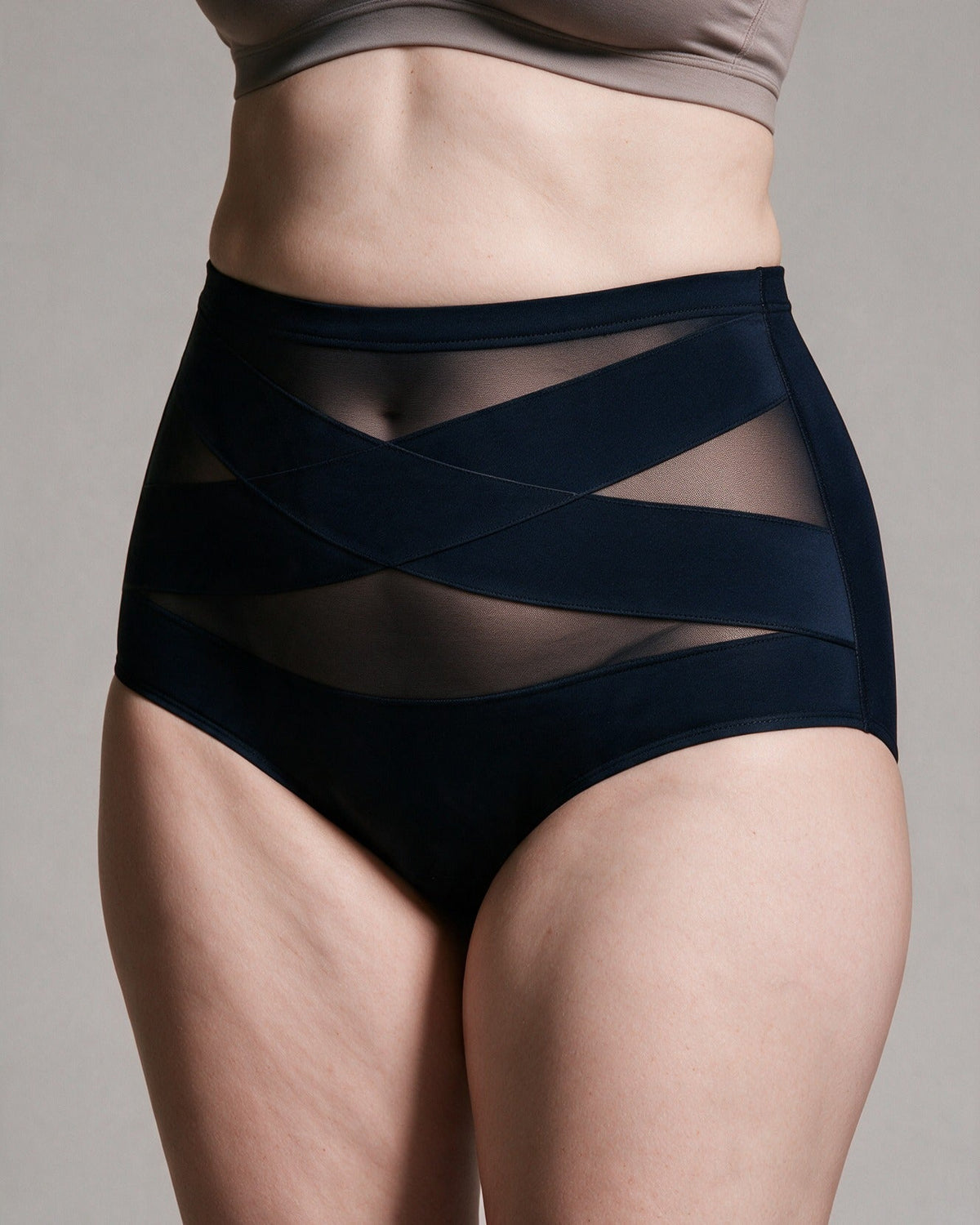 Haven Postpartum Support Brief in Navy, crossed X bands close-up