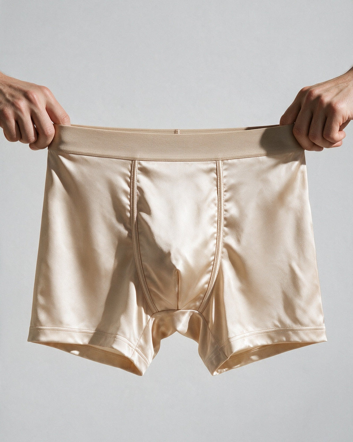 Mayfair men's silk-blend boxer in Champagne, the wide, plain waistband stretched by hand