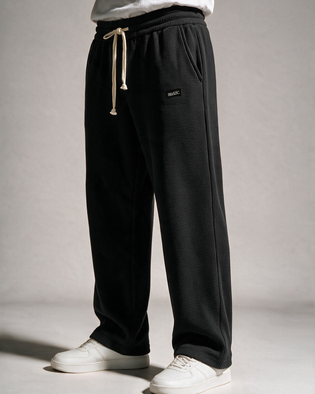 Softloom waffle pants in Black, three-quarter view