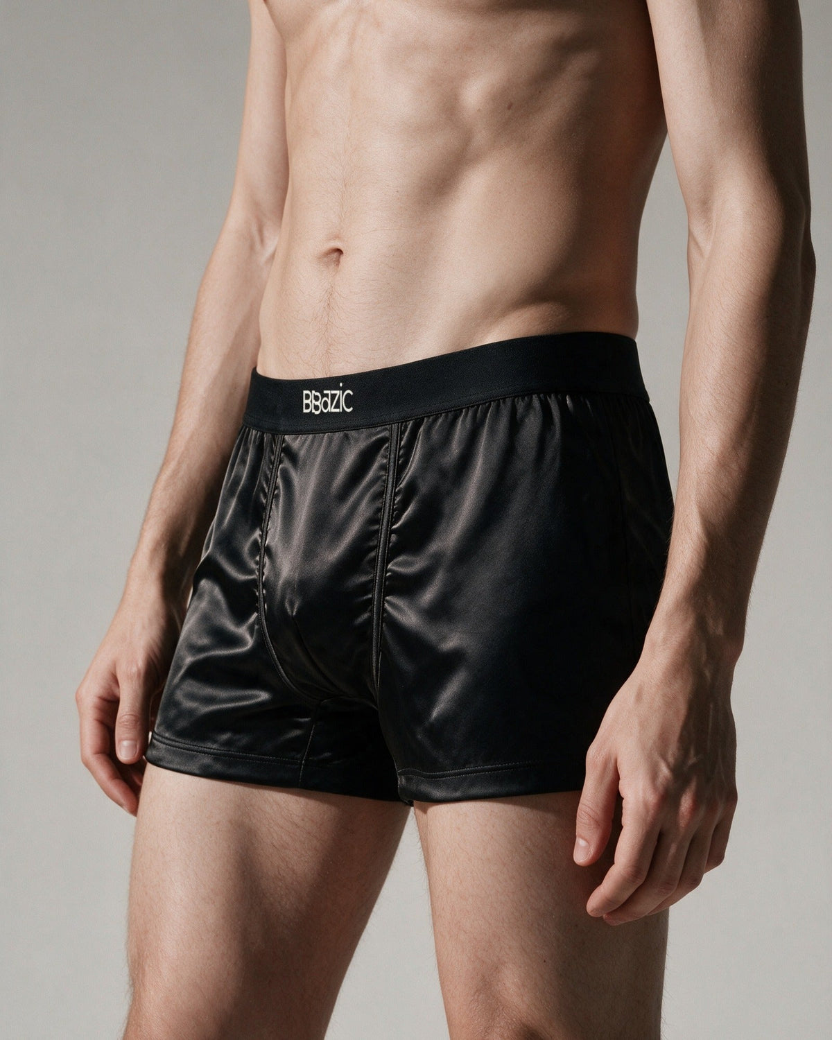 Mayfair men's silk-blend boxer in Black, three-quarter front view, BBazic logo on the waistband
