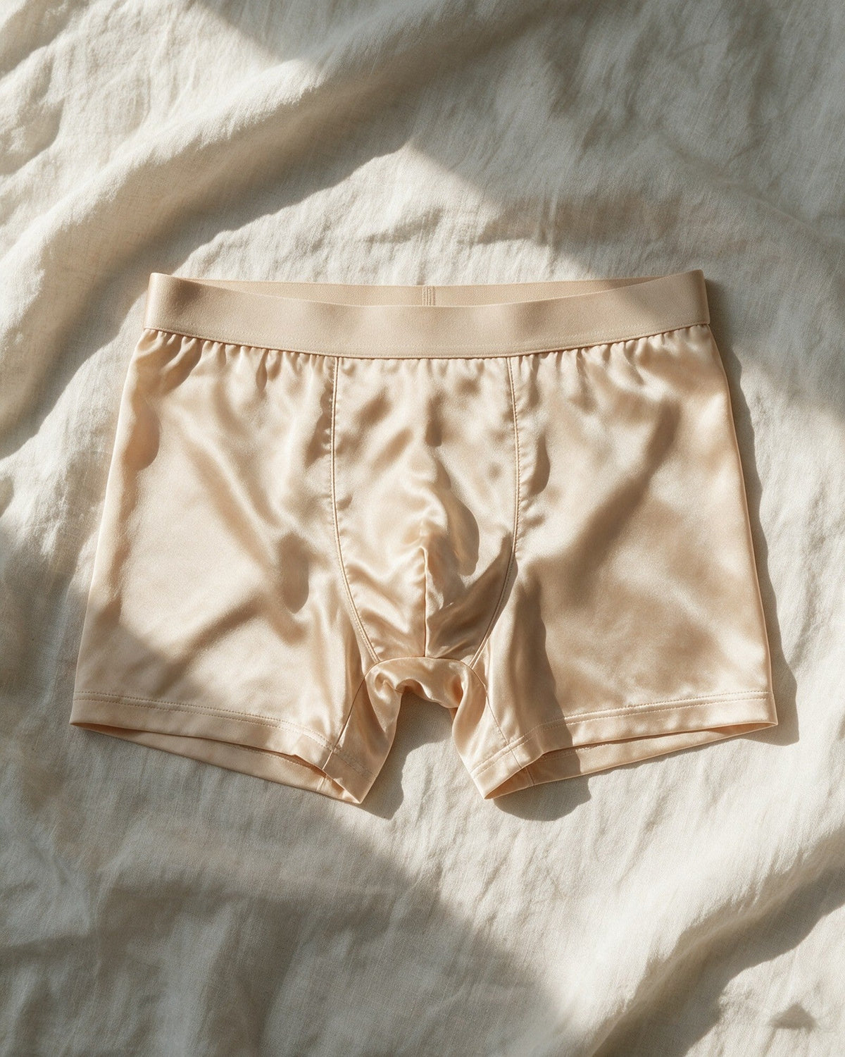 Mayfair men's silk-blend boxer in Champagne, laid open, showing the two curved front seams