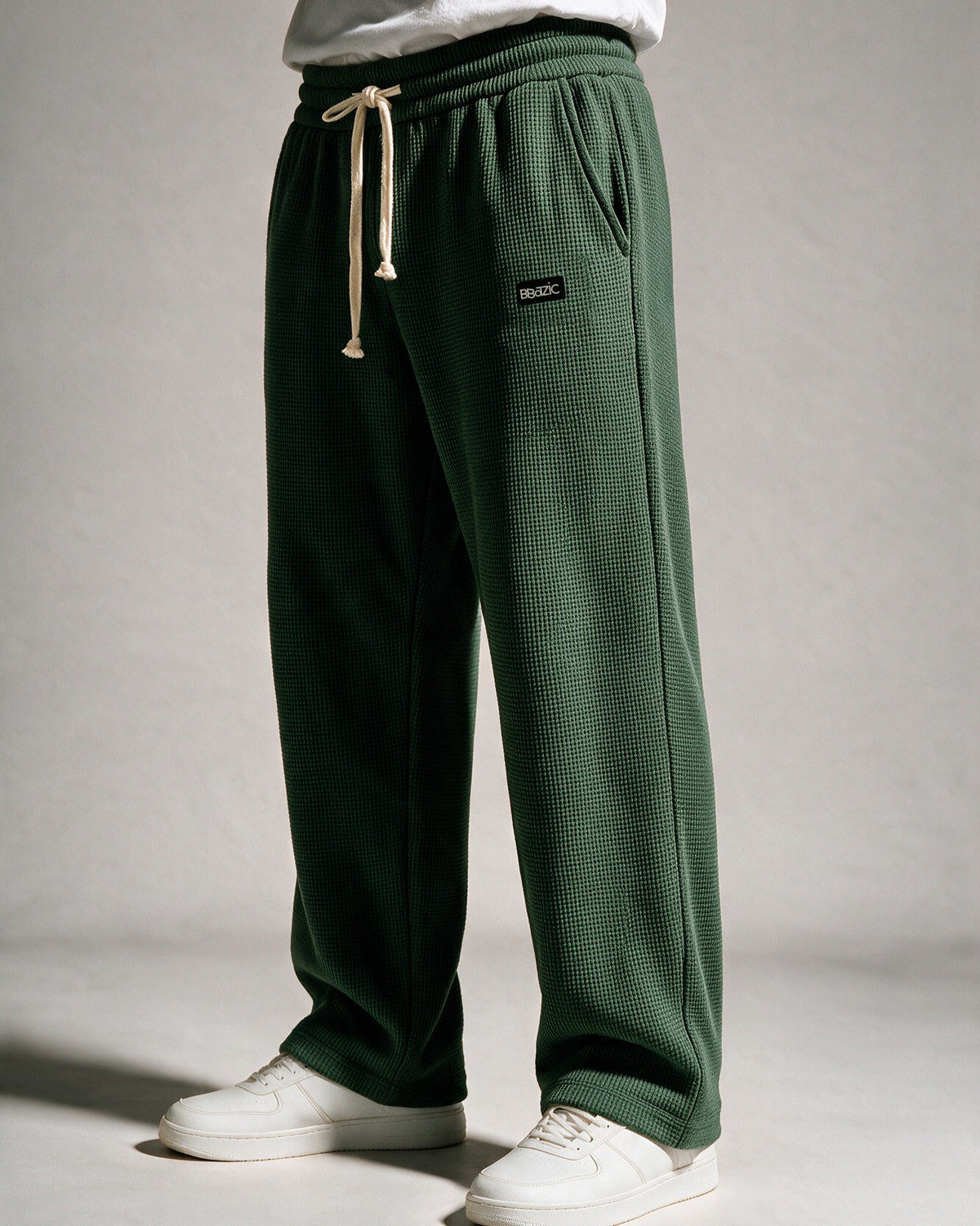 Softloom waffle pants in Dark Green, three-quarter view