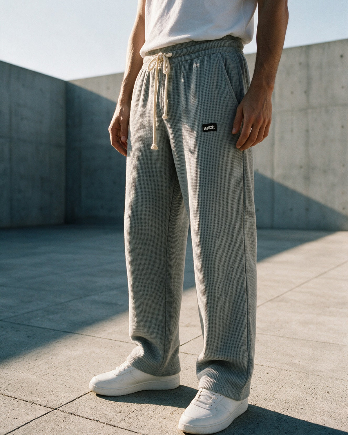Softloom waffle pants in light gray in low sun